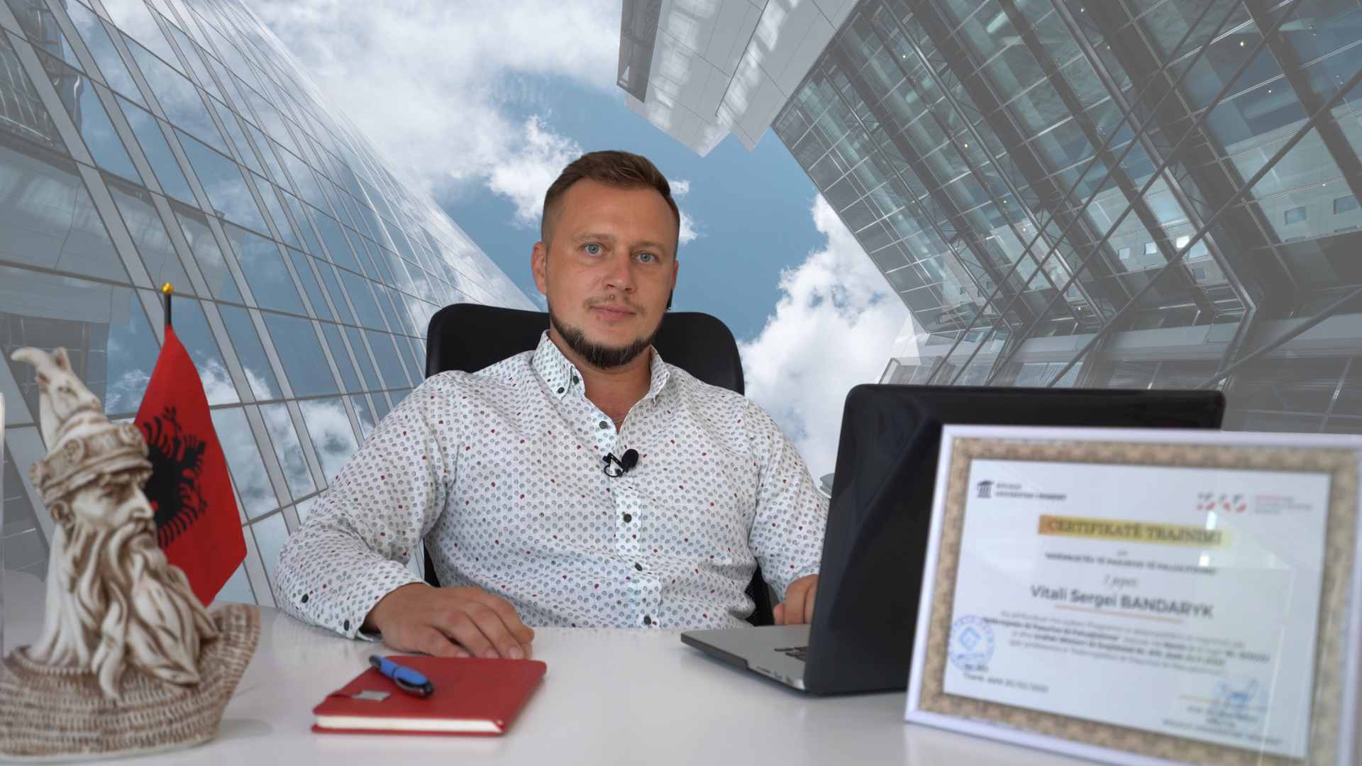 Vitali Bondarik, founder of EstateAll, at the agency office in Vlora, Albania